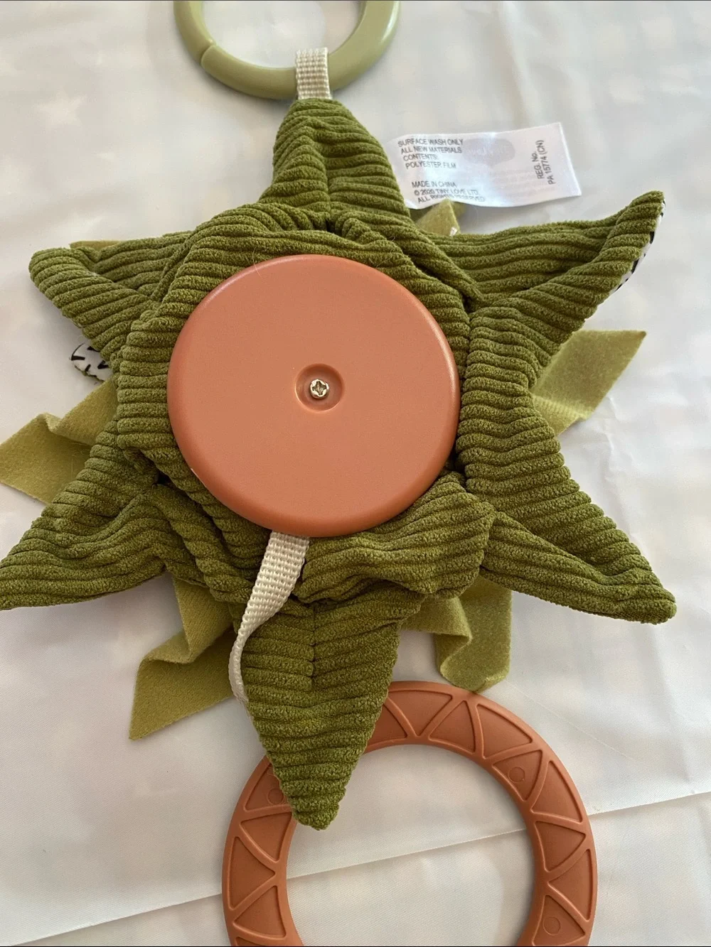 Plush Sunflower Teething Toy in Olive Green by Tiny Love